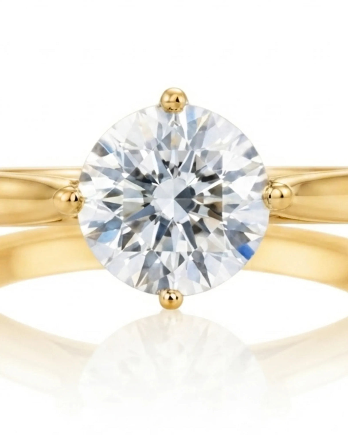 Claudine – Natural Round Diamond Solitaire Engagement Ring