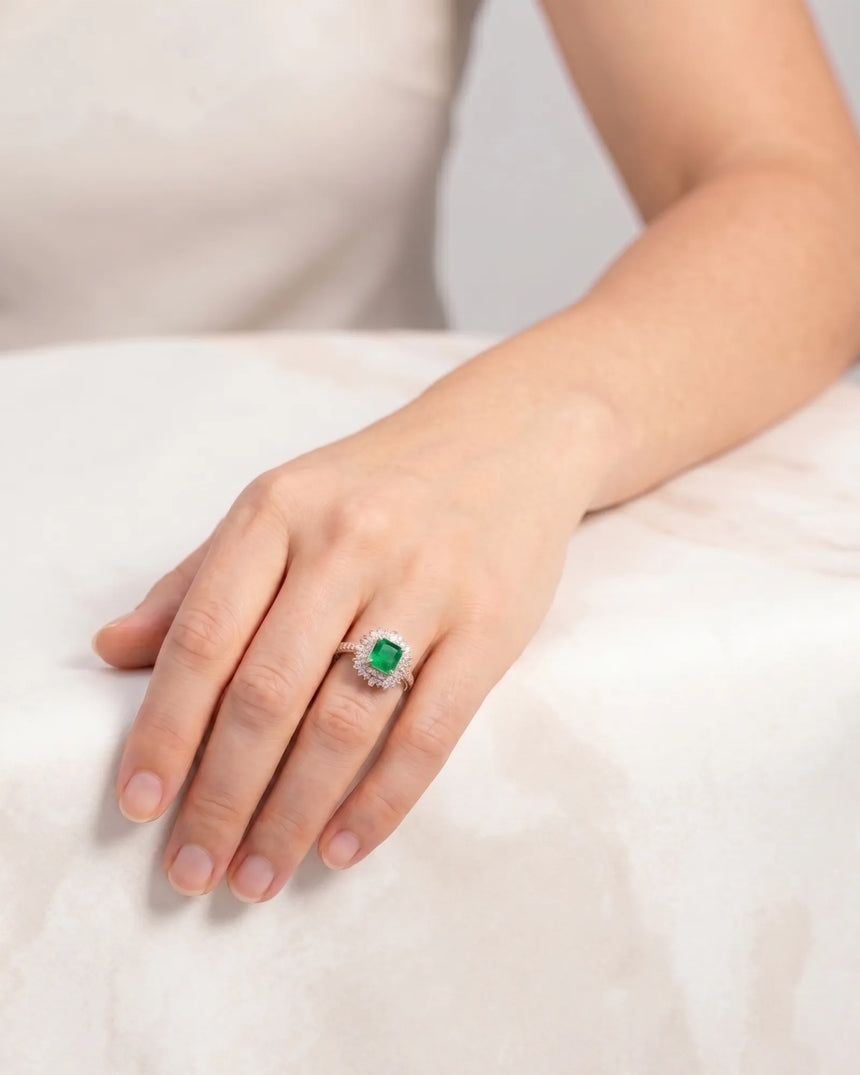 1.5 carat natural emerald ring with diamond halo and pavé band in rose gold | SARATTI