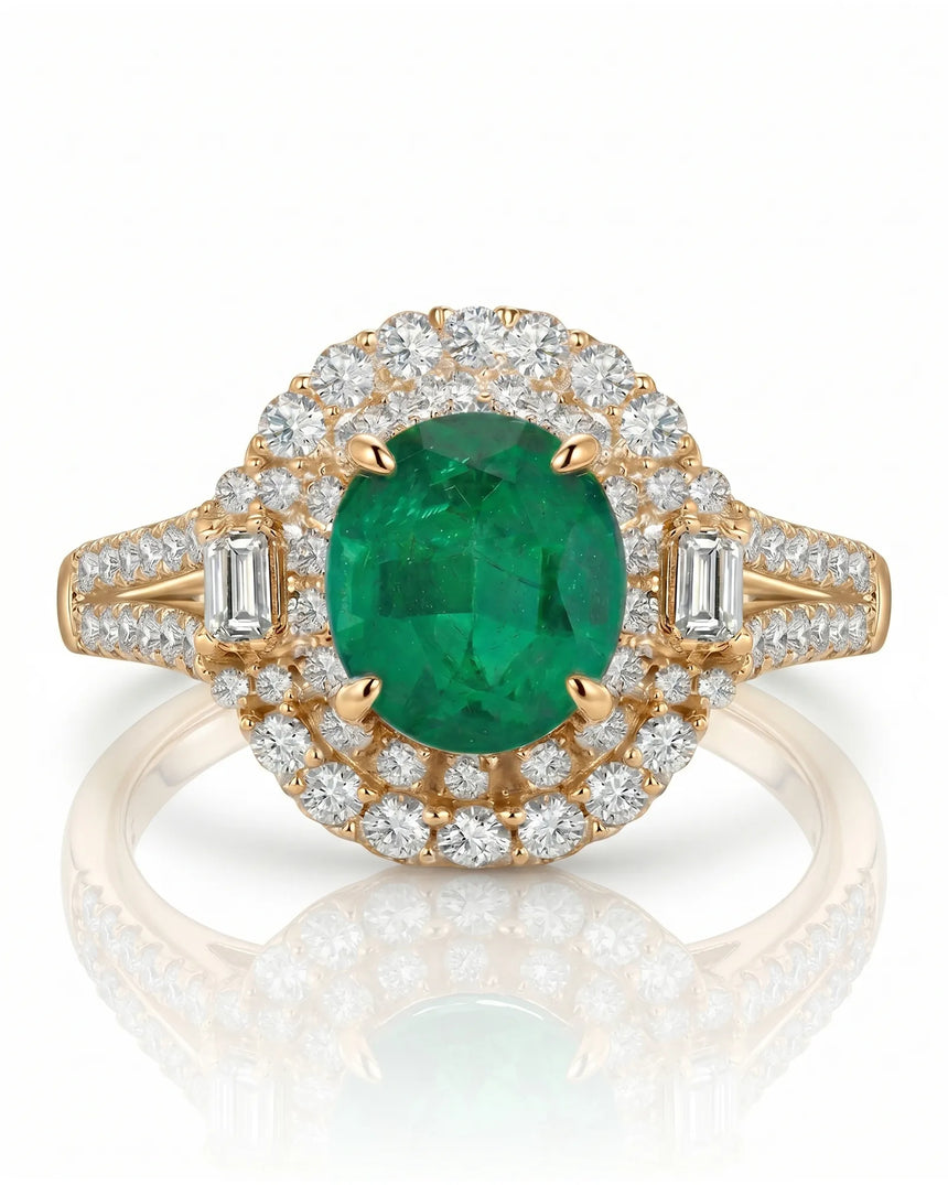 1.5 carat oval natural emerald split shank ring in yellow gold | SARATTI