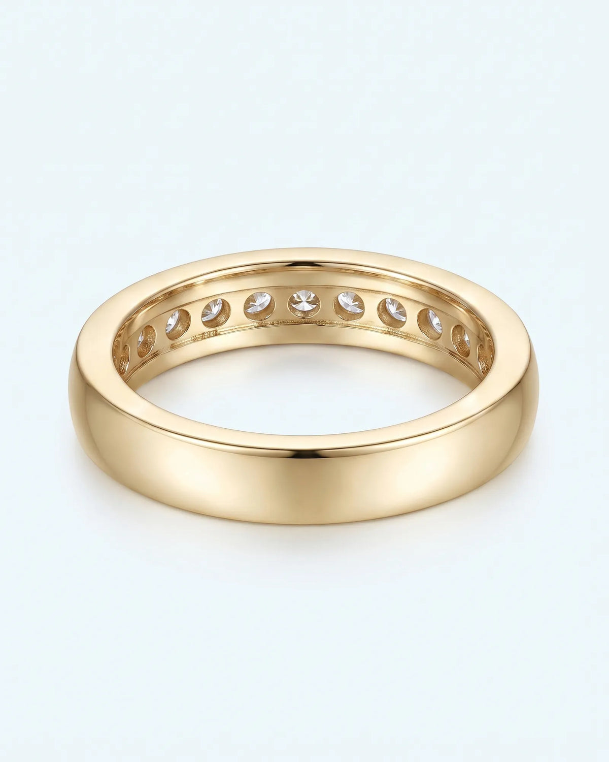 Round diamond channel-set wedding band in 18K yellow gold | SARATTI