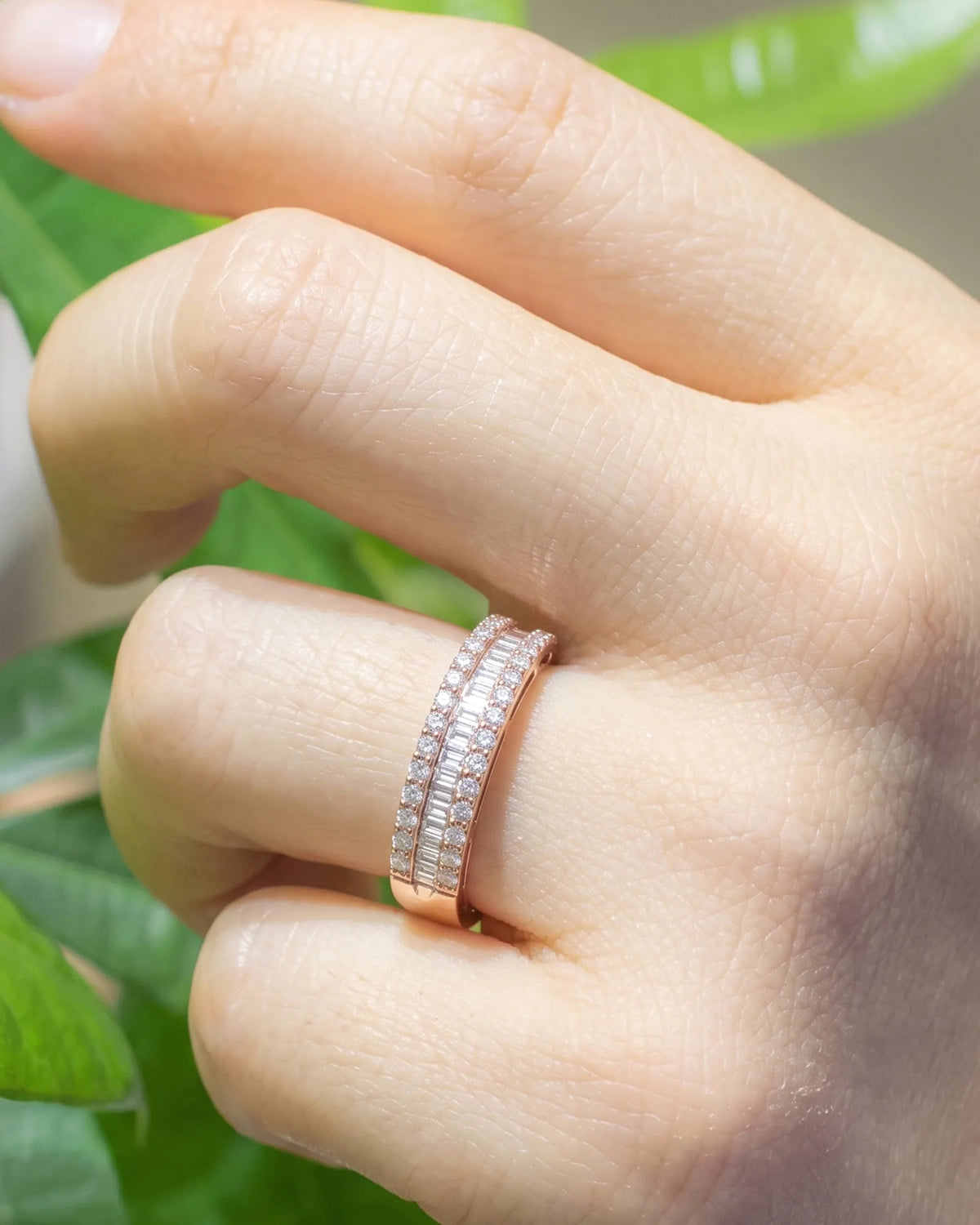 18K rose gold eternity band featuring baguette-cut and round brilliant diamonds | SARATTI