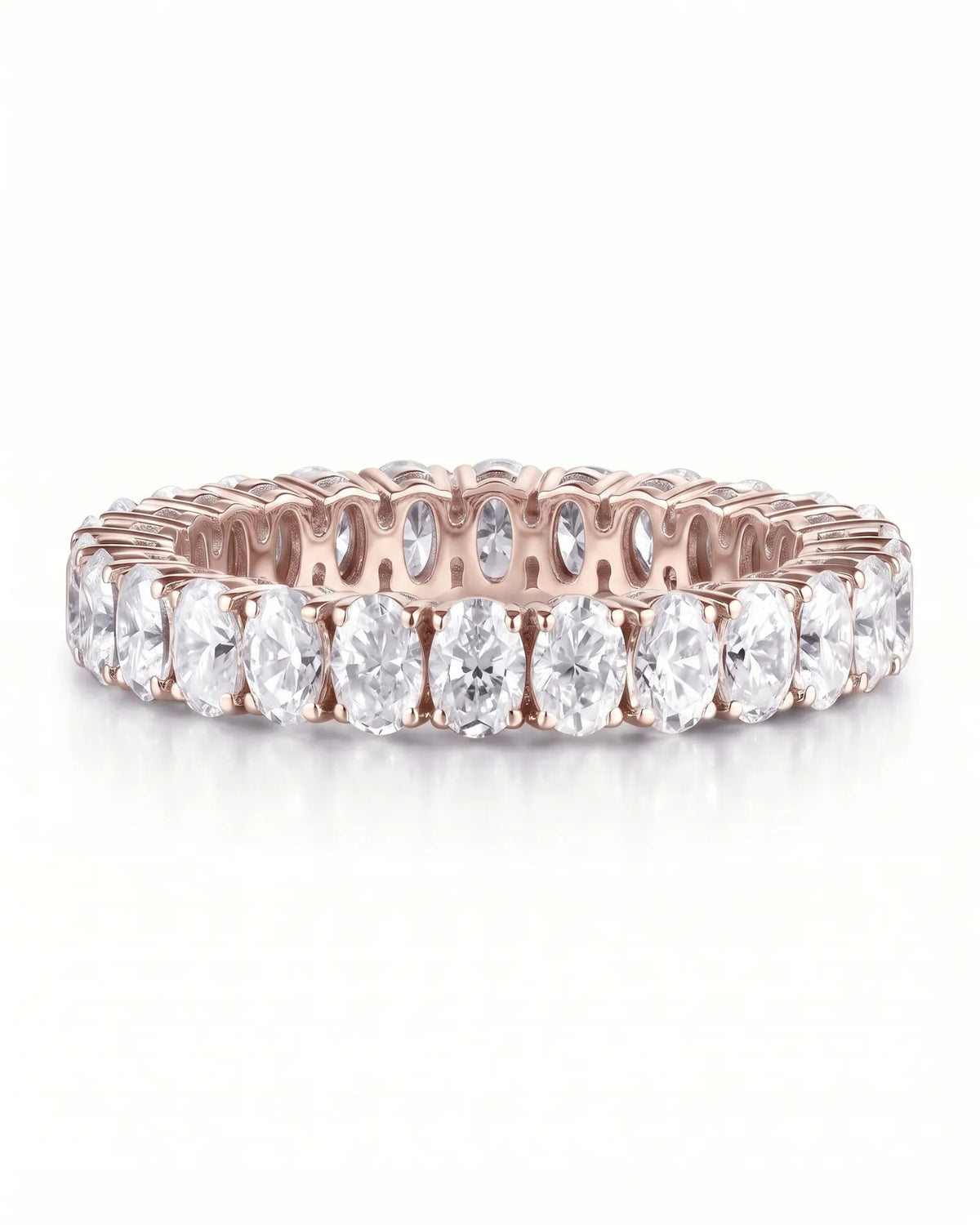 Prong-set oval diamond eternity band in 18K rose gold, detail view | SARATTI