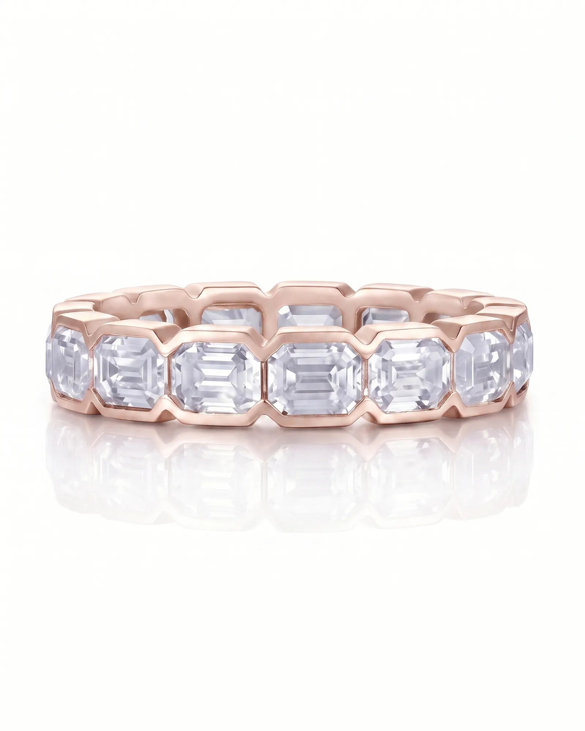 Emerald-cut diamond eternity band with bezel settings, angled view 1 | SARATTI