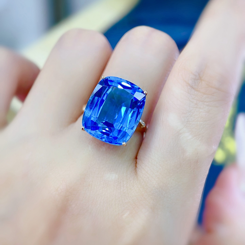 Aurelia Mare cushion cut Swiss Blue Topaz ring in 18K gold