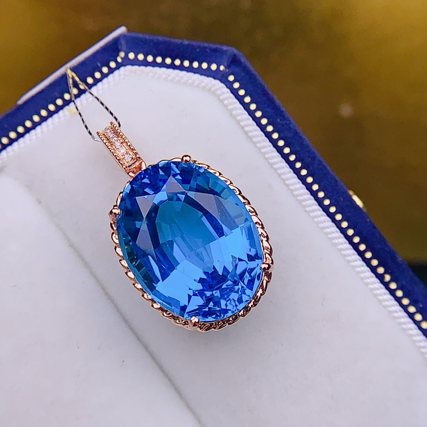 Oval Swiss Blue Topaz Pendant in 18K Rose Gold