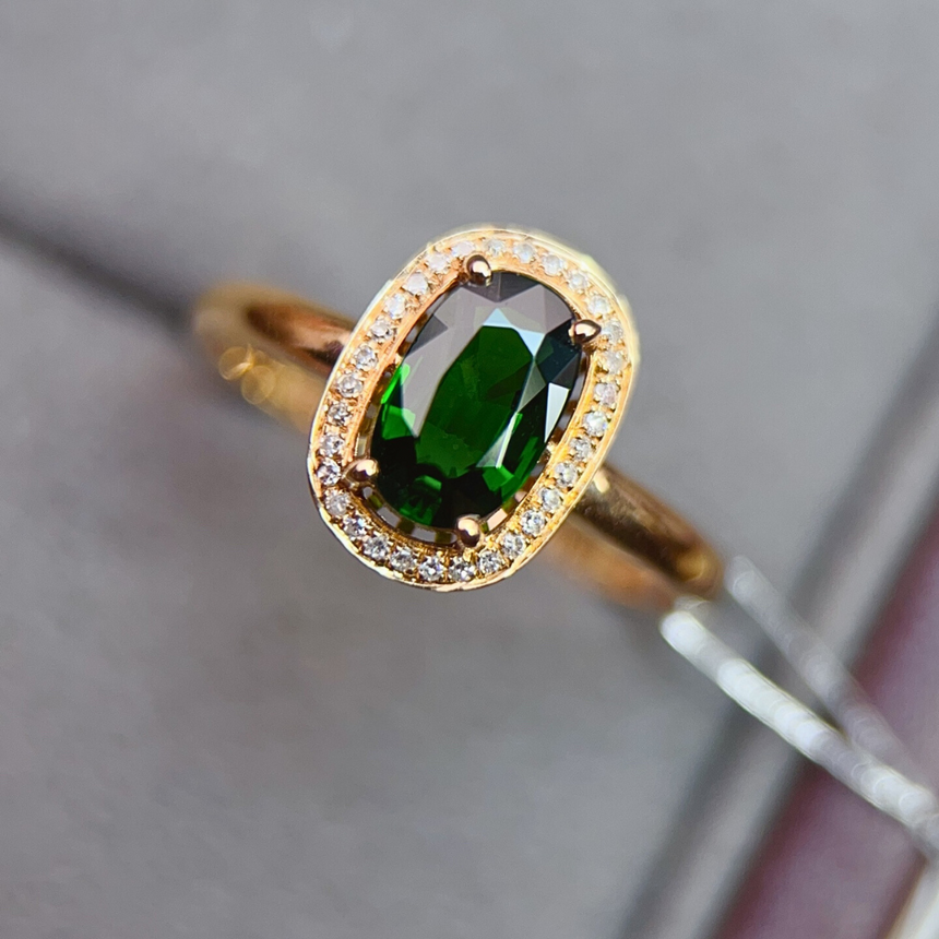 Oval Cut Green Tourmaline Halo Ring in 18K Gold