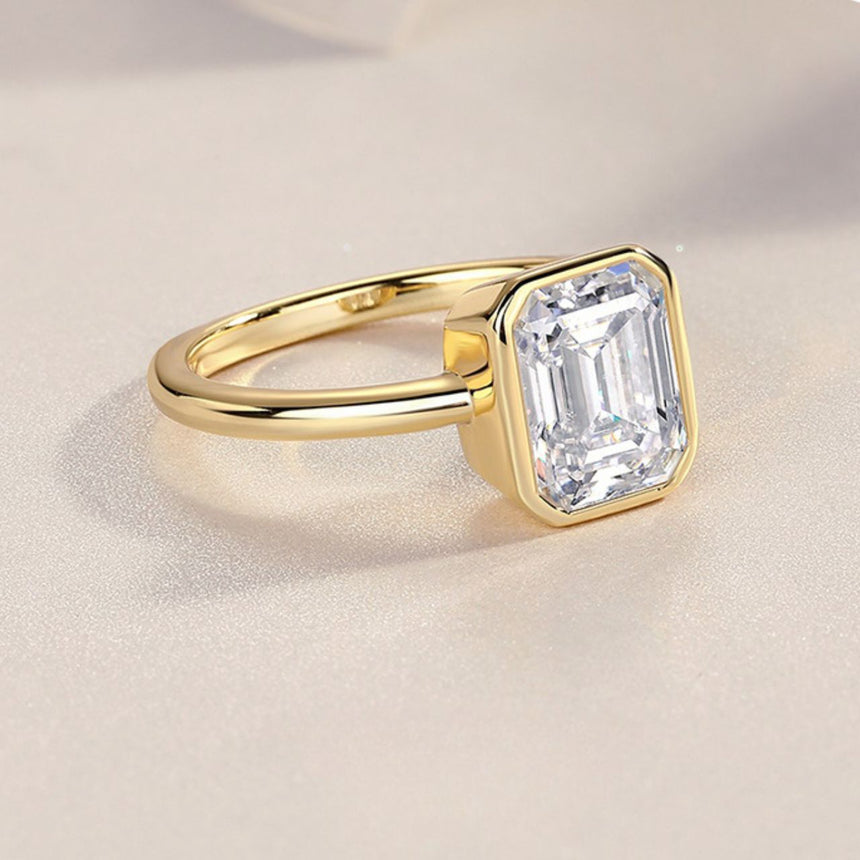 Golden Horizon: 2-Carat Natural Diamond Emerald Cut Bezel Ring