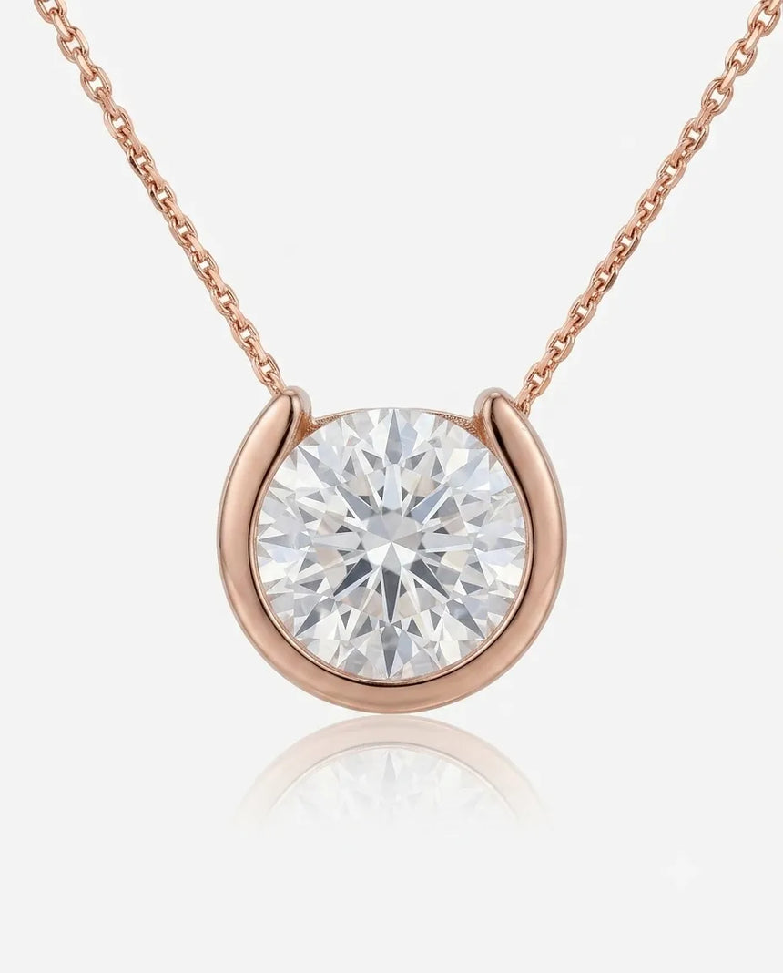 18K Rose Gold petite bezel diamond solitaire necklace, close-up front view | SARATTI