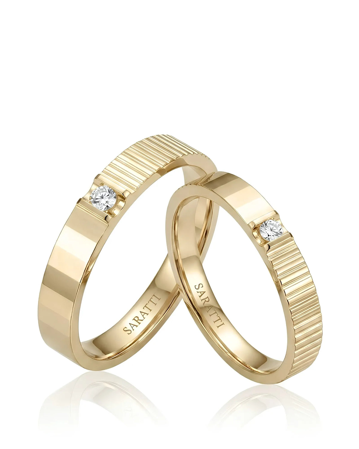 18K yellow gold couple wedding rings featuring natural diamonds and a refined prism-inspired design | SARATTI