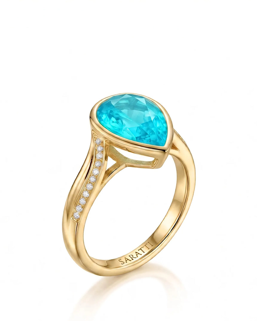 Yellow gold view of Aveline Vow Pear Paraiba Tourmaline diamond bypass setting | SARATTI
