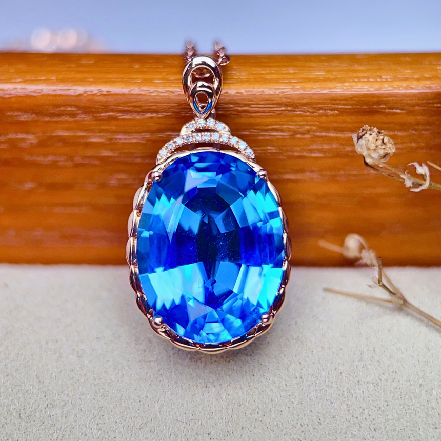 Natural Blue Topaz Oval Pendant with Diamond Accents