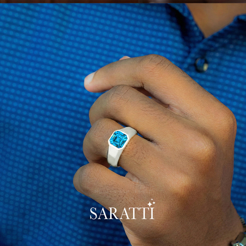 Mens blue topaz ring worn on hand in platinum | SARATTI