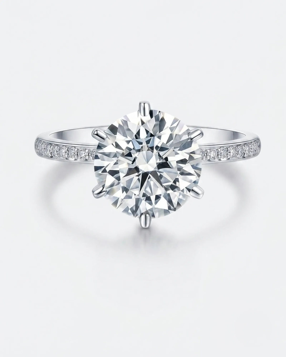 3 carat moissanite six-prong ring with side stones in platinum | SARATTI