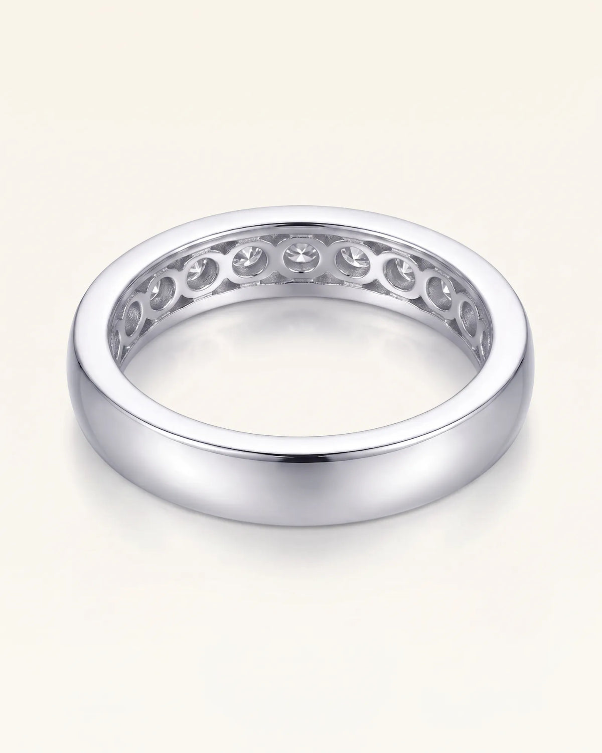 Channel-set diamond wedding band with polished platinum borders | SARATTI