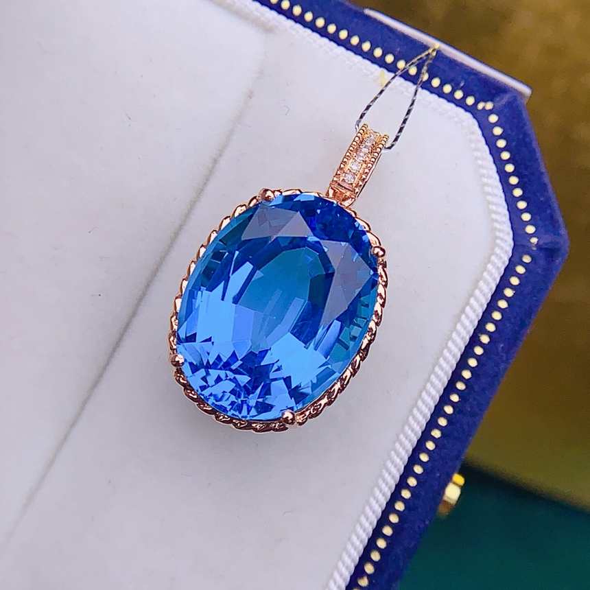 Oval Swiss Blue Topaz Pendant in 18K Rose Gold
