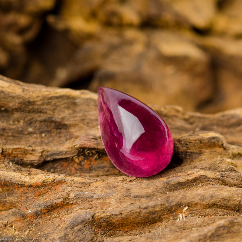 7.05-carat Natural Rubellite Tourmaline in Smooth Domed Pear Cabochon Cut | Saratti