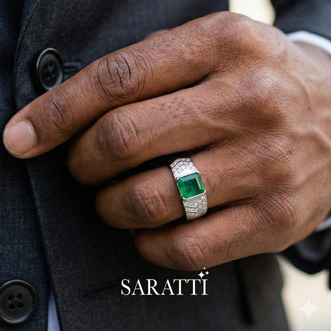 Mens emerald ring worn on hand in 18K white gold | SARATTI