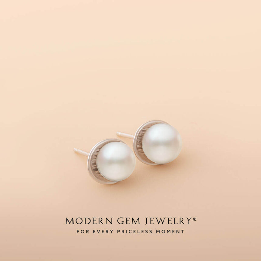 minimalist white gold pearl studs