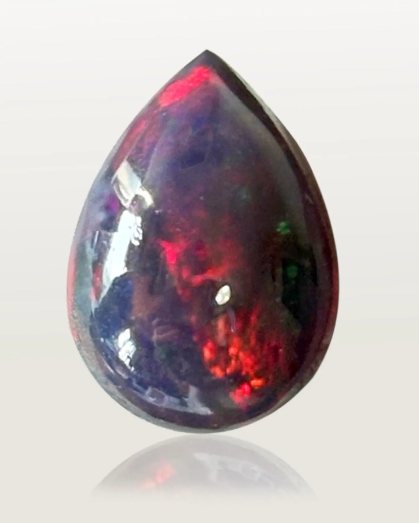 Alternate angle of Natural Black Opal with green and blue play-of-colour | SARATTI