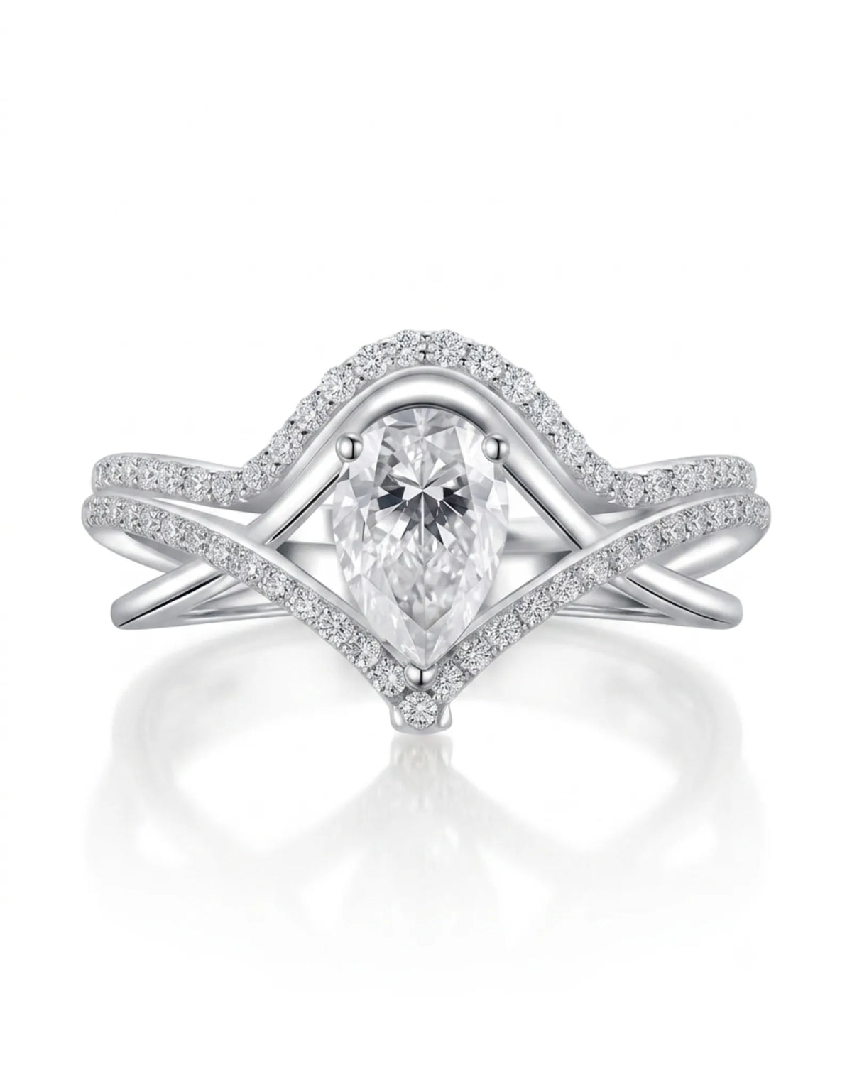 Amara pear-cut moissanite bridal set with V-shaped bands and round accents in 18K white gold | SARATTI