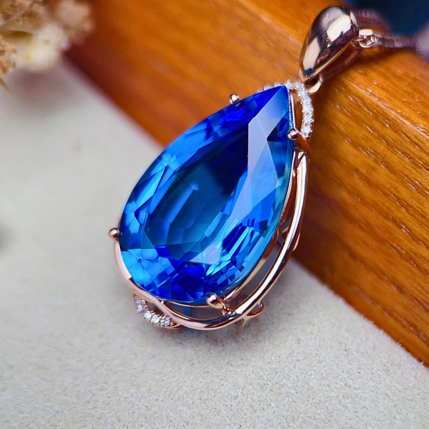 19.8ct natural Swiss Blue Topaz pendant with diamonds