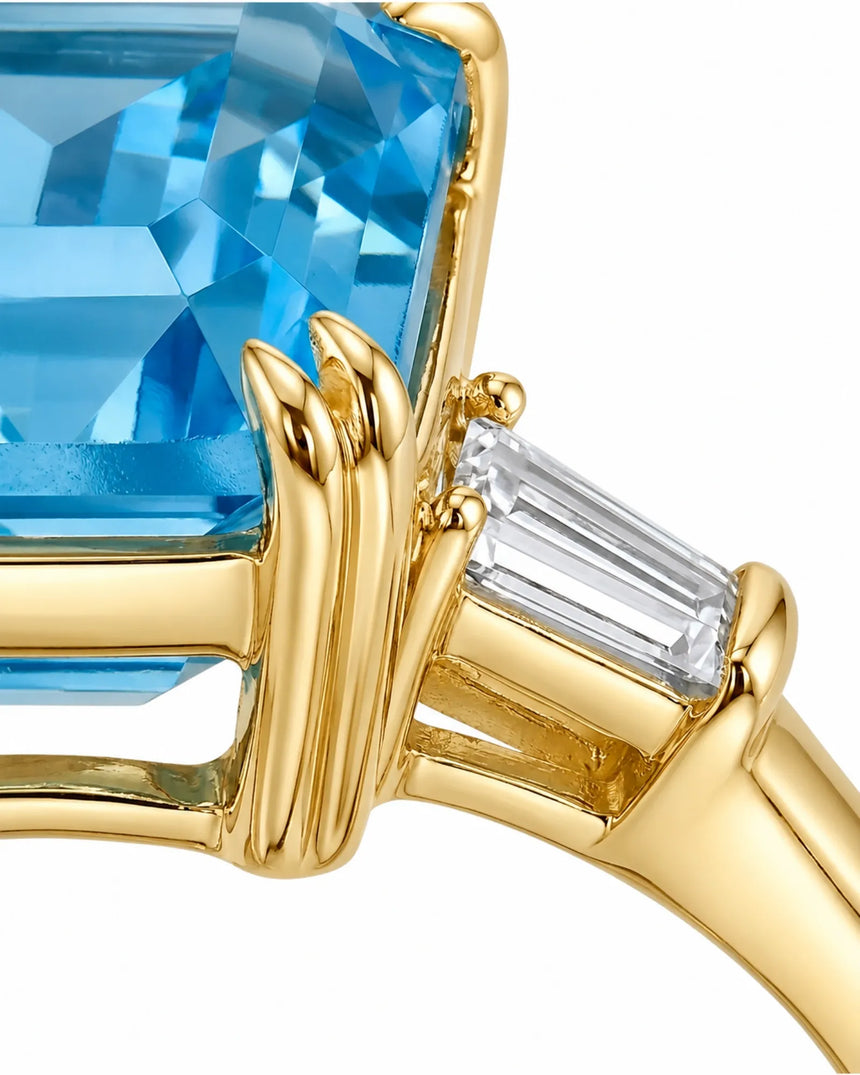 Aquamarine and diamond engagement ring with three stone design in 18K yellow gold | SARATTI