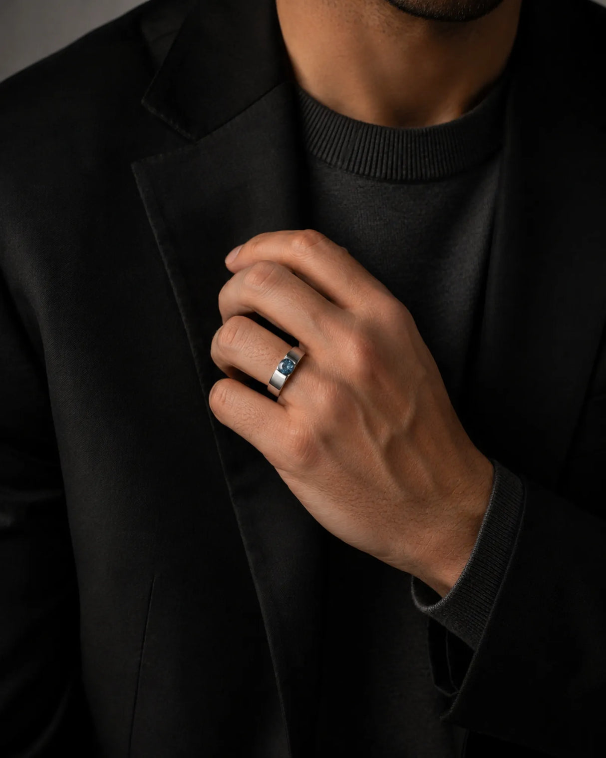 Architectural blue diamond ring with sculpted wide band and minimalist tension design in 18K white gold | SARATTI