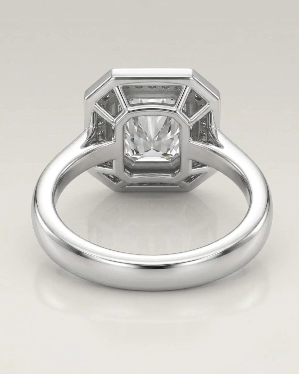 Architectural platinum radiant cut ring with brilliant halo-set moissanite | SARATTI
