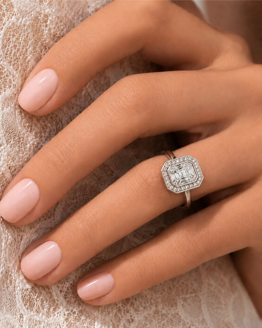Architectural white gold radiant cut ring with brilliant halo-set moissanite | SARATTI