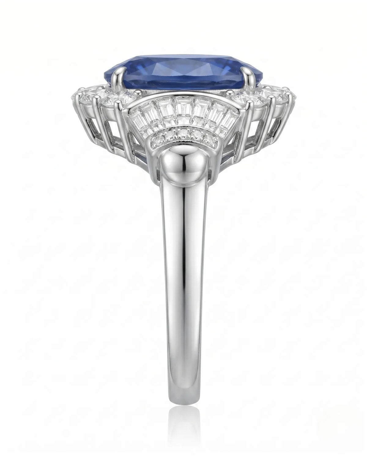 Art Deco sapphire ring with round and tapered baguette diamonds in polished platinum | SARATTI