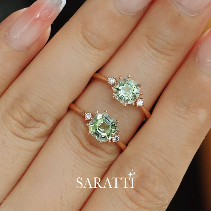Model Stacks Two Yellow Gold Electric Dreams Three Stone Green Tourmaline Rings on one finger | Saratti Fine Jewelry