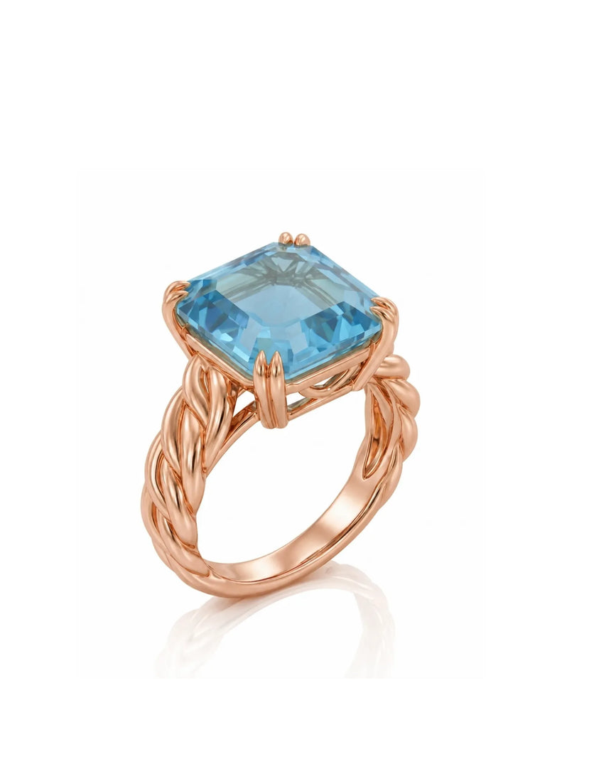 Asscher cut aquamarine prong set ring with sculptural rope band in 18K rose gold | SARATTI