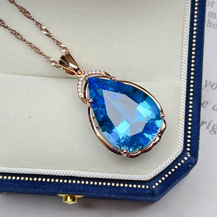 Thalassa’s Tear Blue Topaz Necklace with Diamonds
