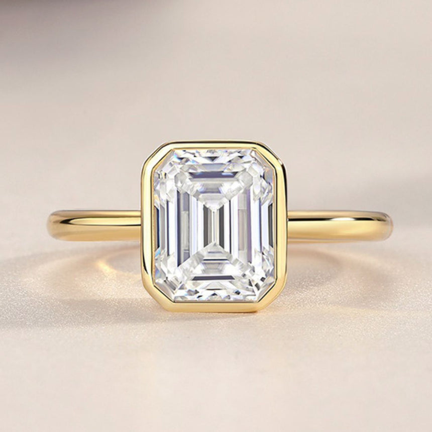 Golden Horizon: 2-Carat Natural Diamond Emerald Cut Bezel Ring