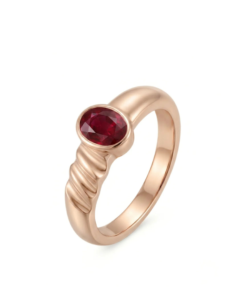 Bezel set oval natural ruby solitaire ring in 18K rose gold with wave detail | SARATTI