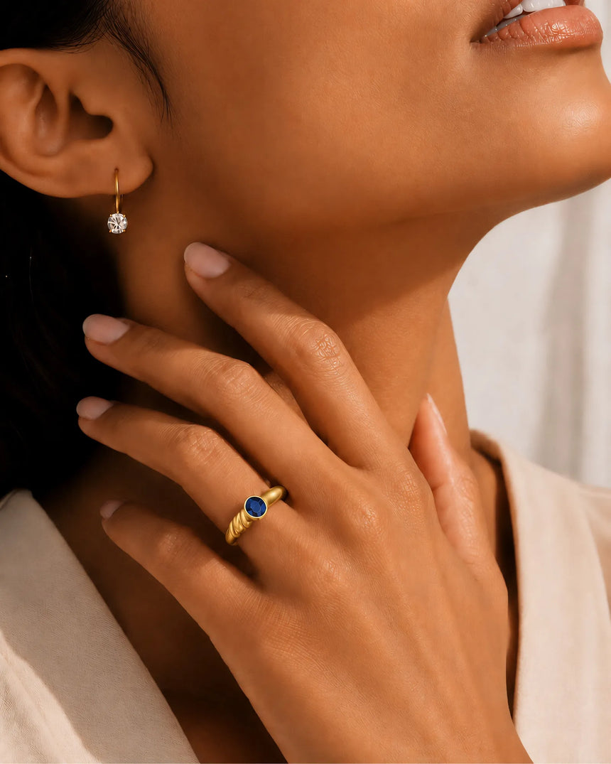 Blue oval natural sapphire ring in smooth bezel set 18K Yellow Gold design | SARATTI