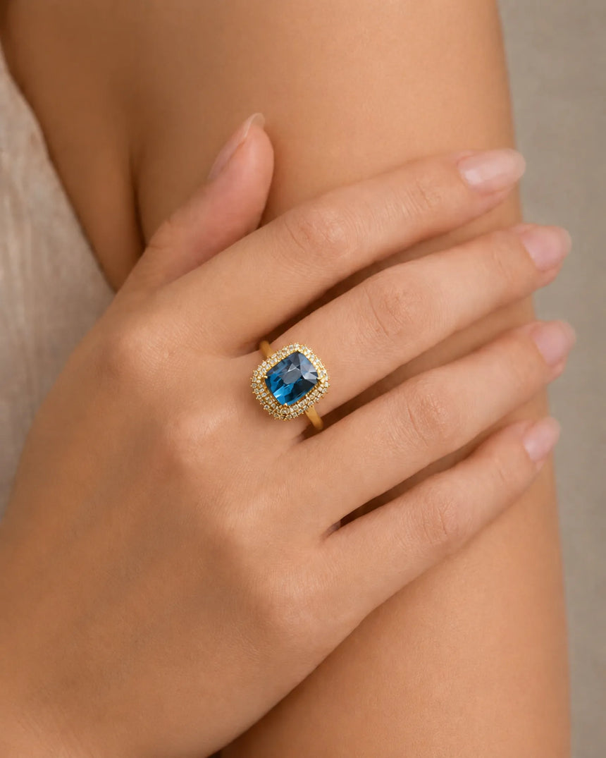 Blue tourmaline engagement ring with double diamond halo in classic 18K yellow gold | SARATTI