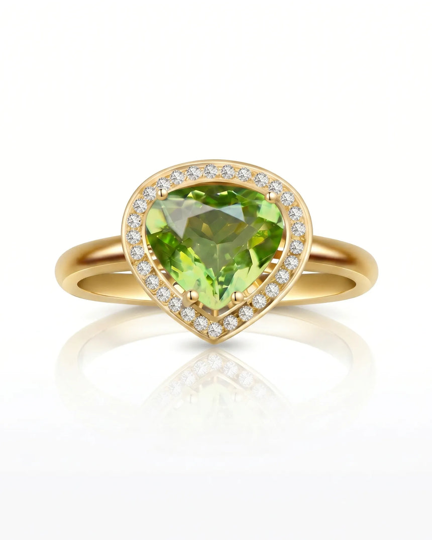 Bright green tourmaline ring with delicate diamond halo and 18K Yellow Gold setting | SARATTI