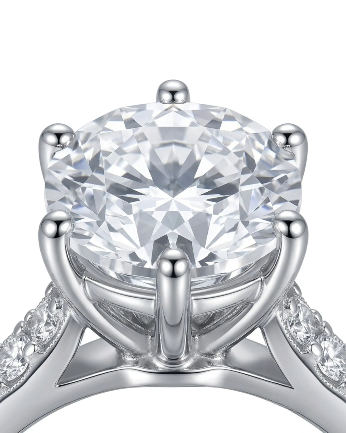 Classic round moissanite ring with polished band and pavé accents in platinum | SARATTI
