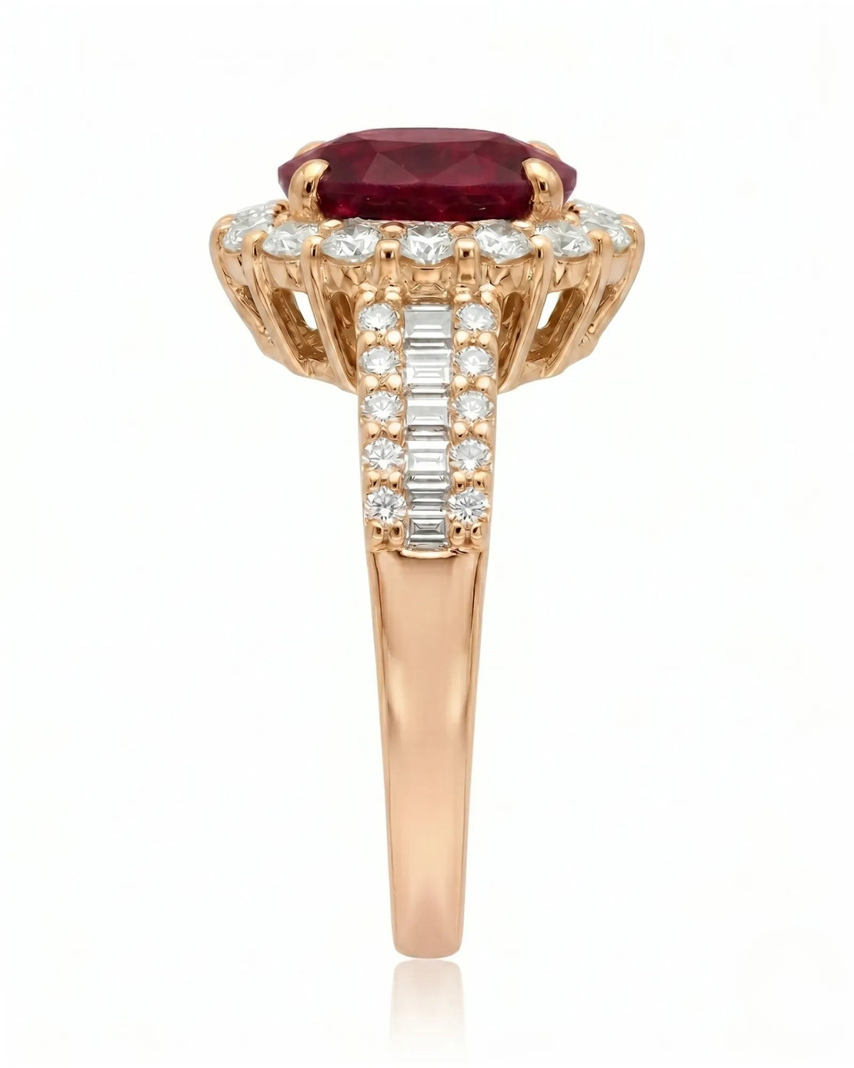 Classic ruby ring with round diamond halo and baguette accents in rose gold | SARATTI