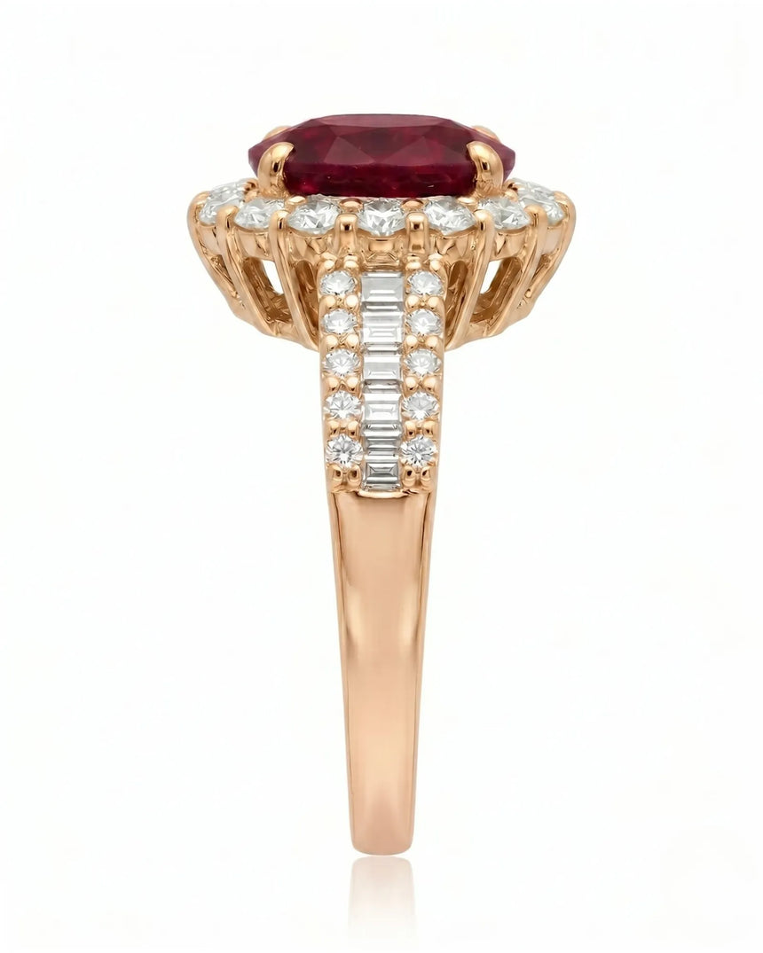 Classic ruby ring with round diamond halo and baguette accents in rose gold | SARATTI