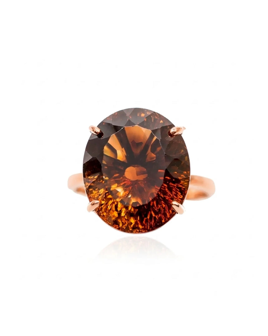 Cognac Imperial Topaz engagement ring featuring an oval center and six-petal 18K rose gold setting | SARATTI