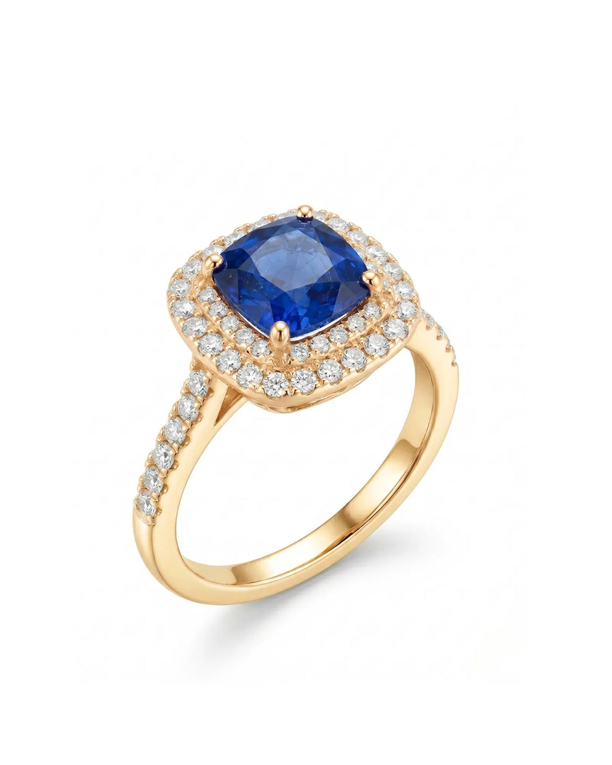 Cushion blue sapphire ring with double diamond halo in 18K yellow gold | SARATTI