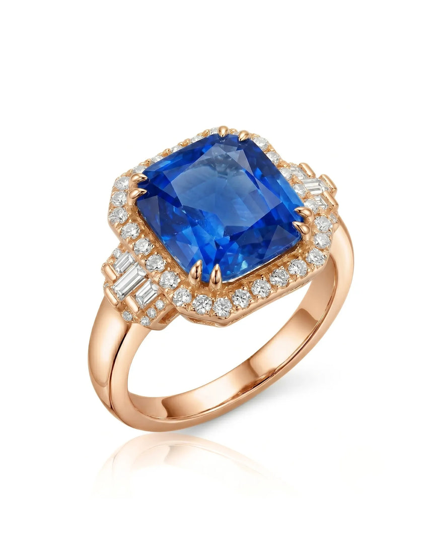 Cushion cut blue sapphire ring with diamond halo and baguette shoulders in 18K rose gold | SARATTI