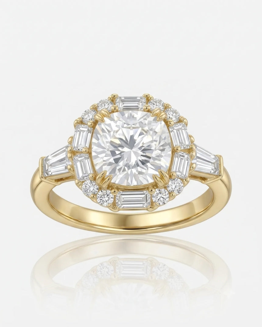 D color cushion moissanite framed by baguette and round side stones in 18K yellow gold | SARATTI
