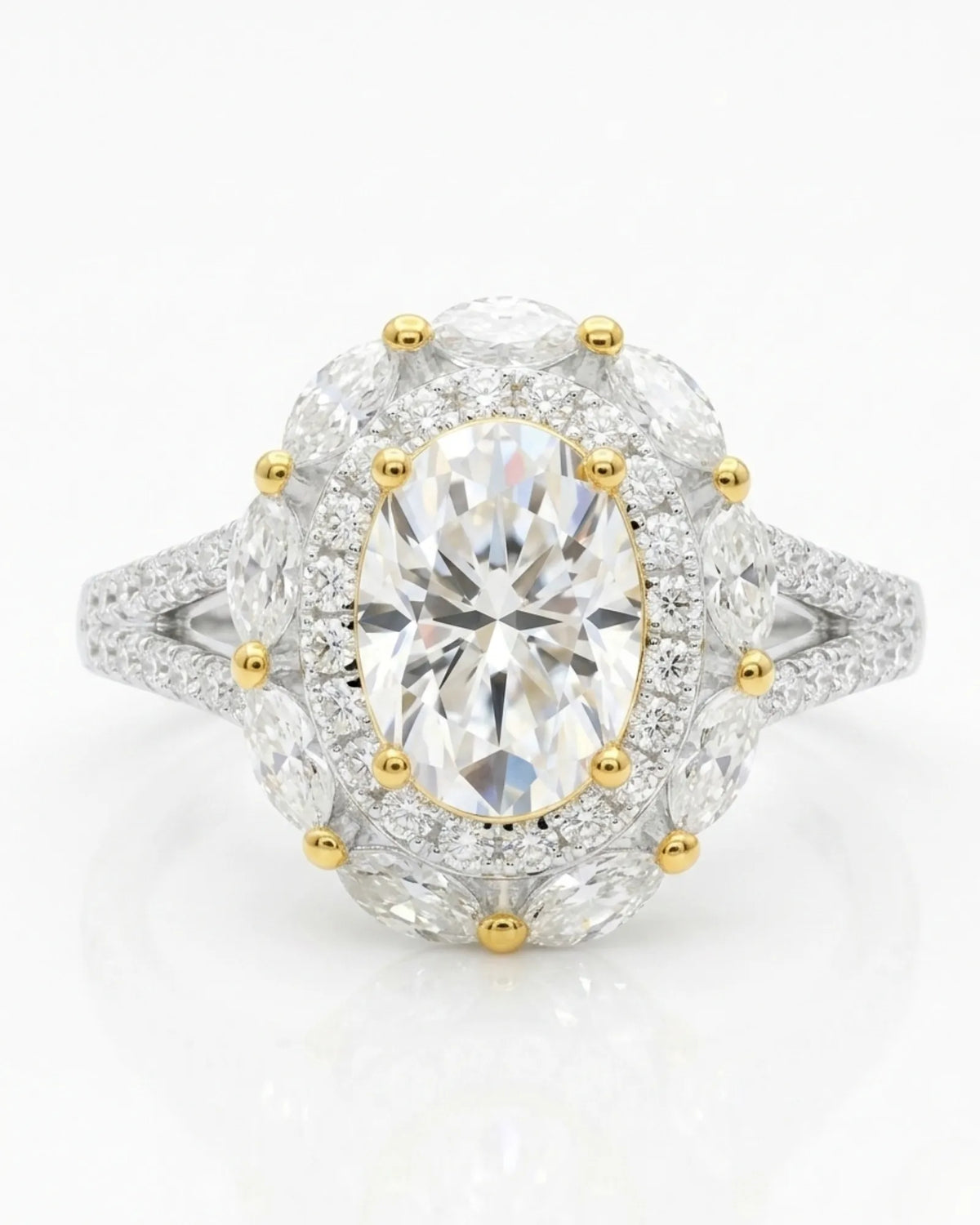 D color oval moissanite center framed by round and marquise stones in two tone | SARATTI