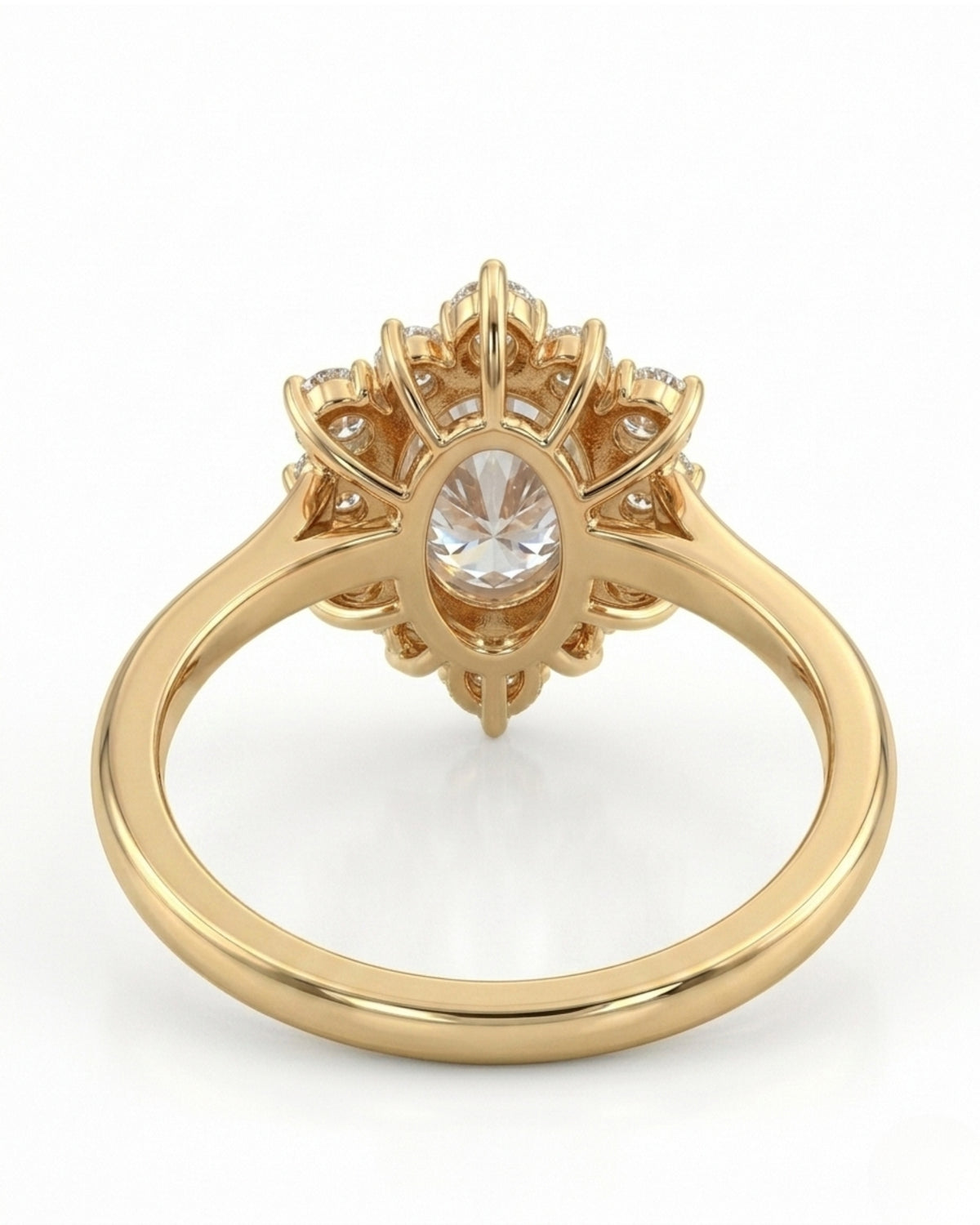 D color oval moissanite framed by round moissanite stones in polished 18K yellow gold | SARATTI