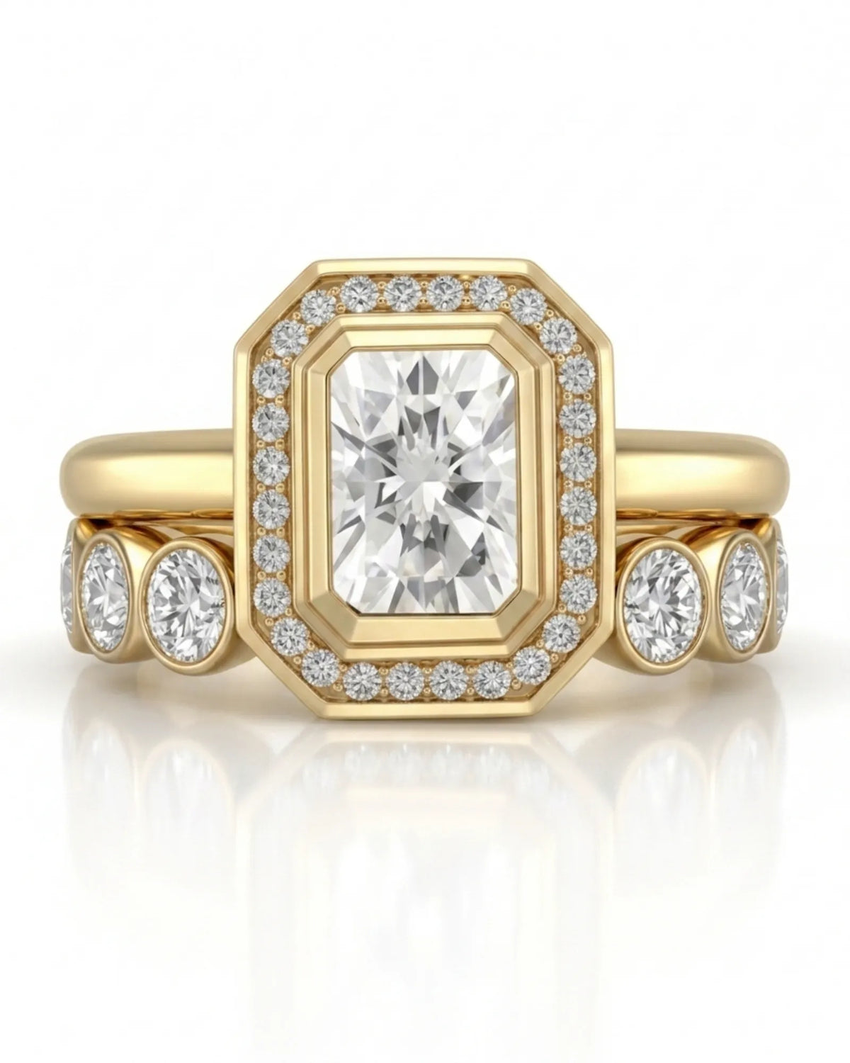 D color radiant moissanite center framed by round moissanite accents in polished 18K yellow gold | SARATTI