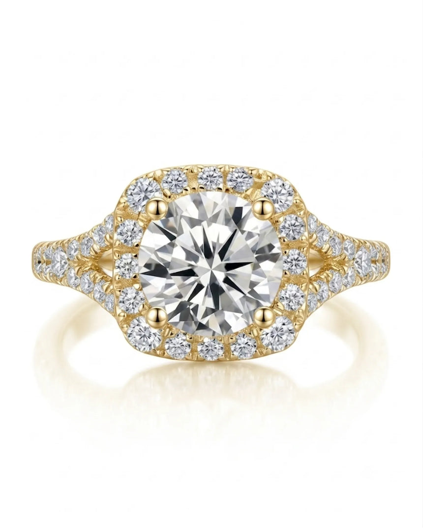 D colorless cushion moissanite framed by brilliant round stones in 18K yellow gold | SARATTI