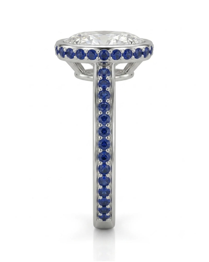 D colorless oval moissanite framed by vivid blue sapphires in enduring polished platinum | SARATTI